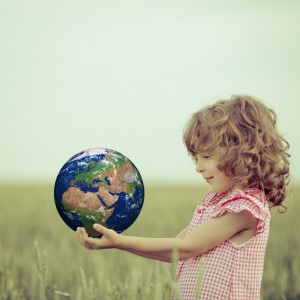Child holding Earth in hands