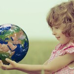 Child holding Earth in hands